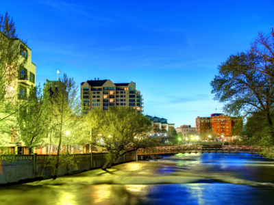 innline image showing the Truckee River in downtown Reno at dusk